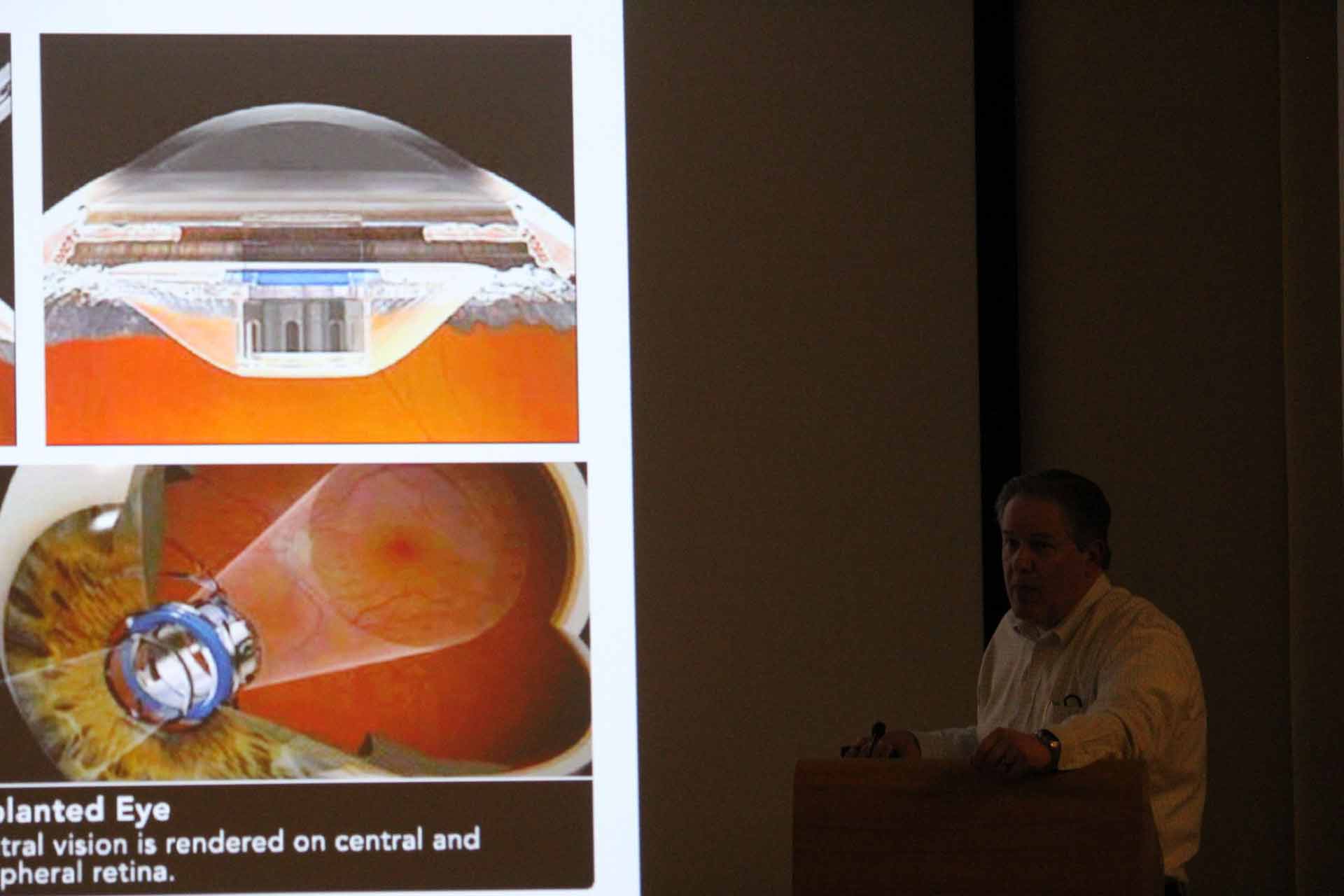 Set of three photos.  two phots of artificial lens on eye and one photo of person speaking at podium. 