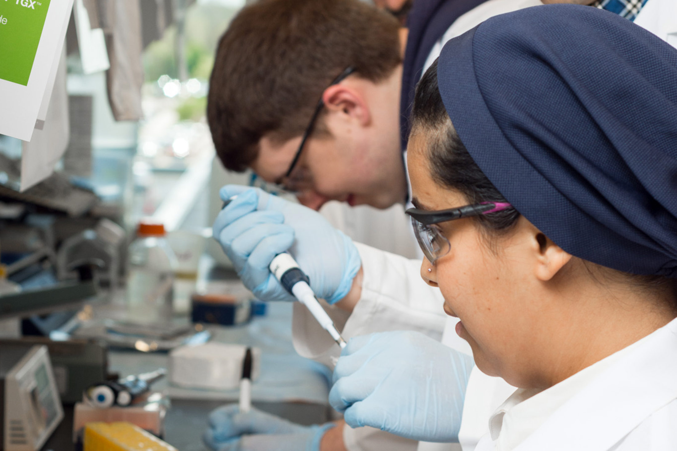 two people working together in a lab.