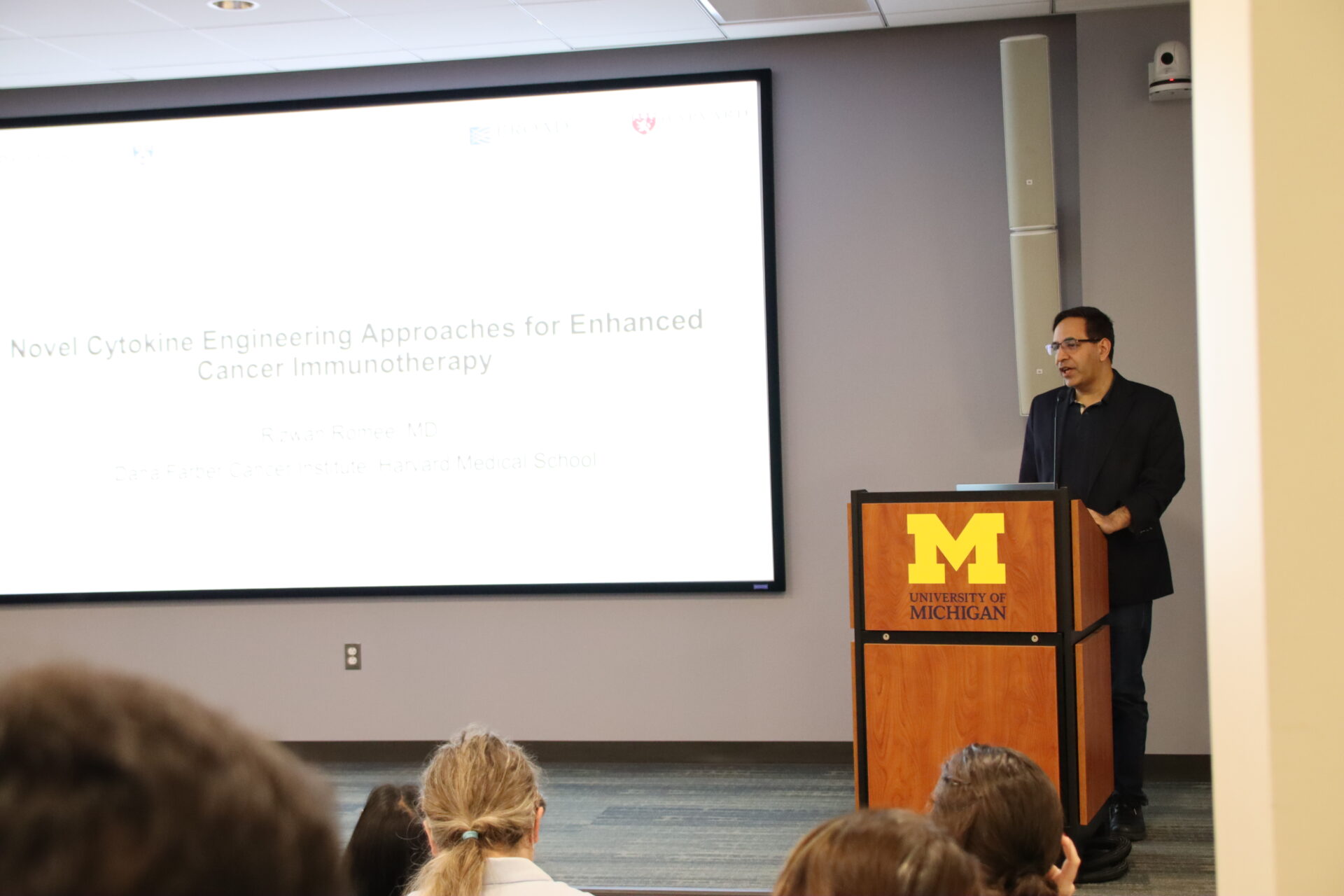 Dr. Romee giving his lecture to a collection of students